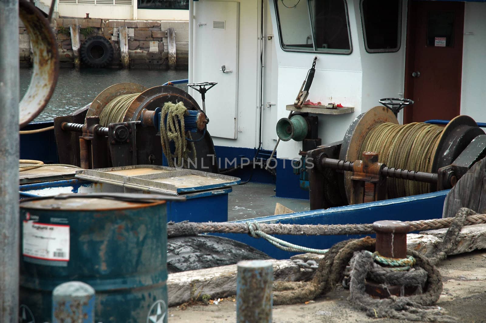 fishing boat equipment, old rusty boat, ropes