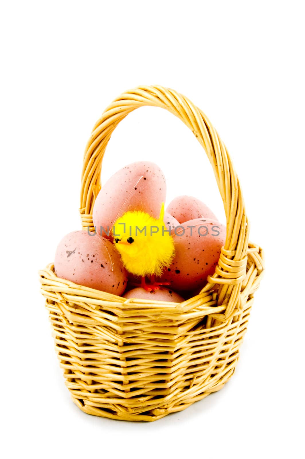 small basket with eggs and a eastern chicken isolated on white