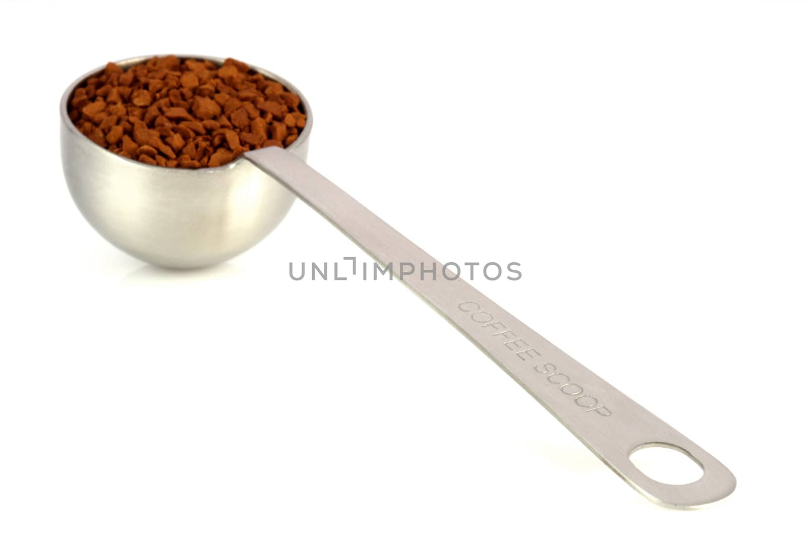 fresh instant gourmet coffee scoop isolated against white background