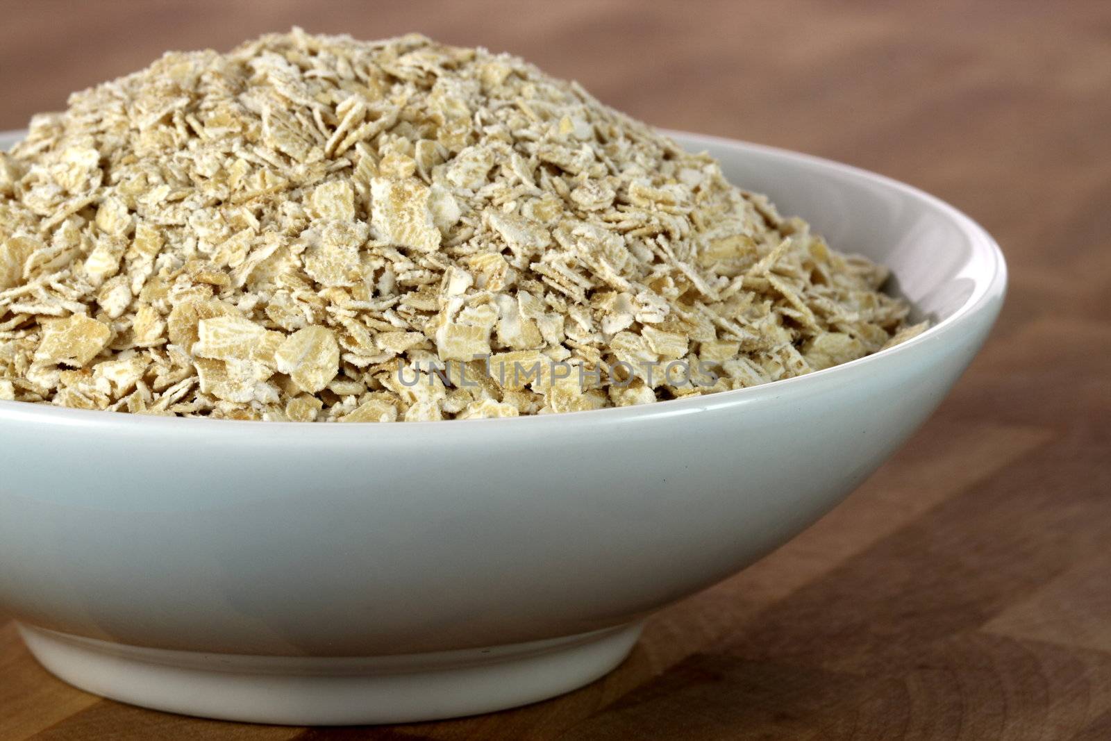 oat flakes in a bowl by tacar