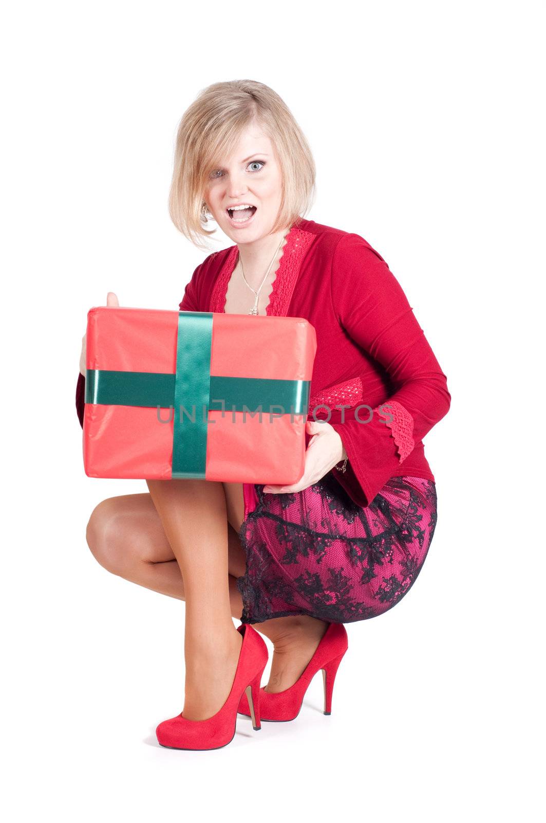 Happy woman with Christmas presents isolated on white