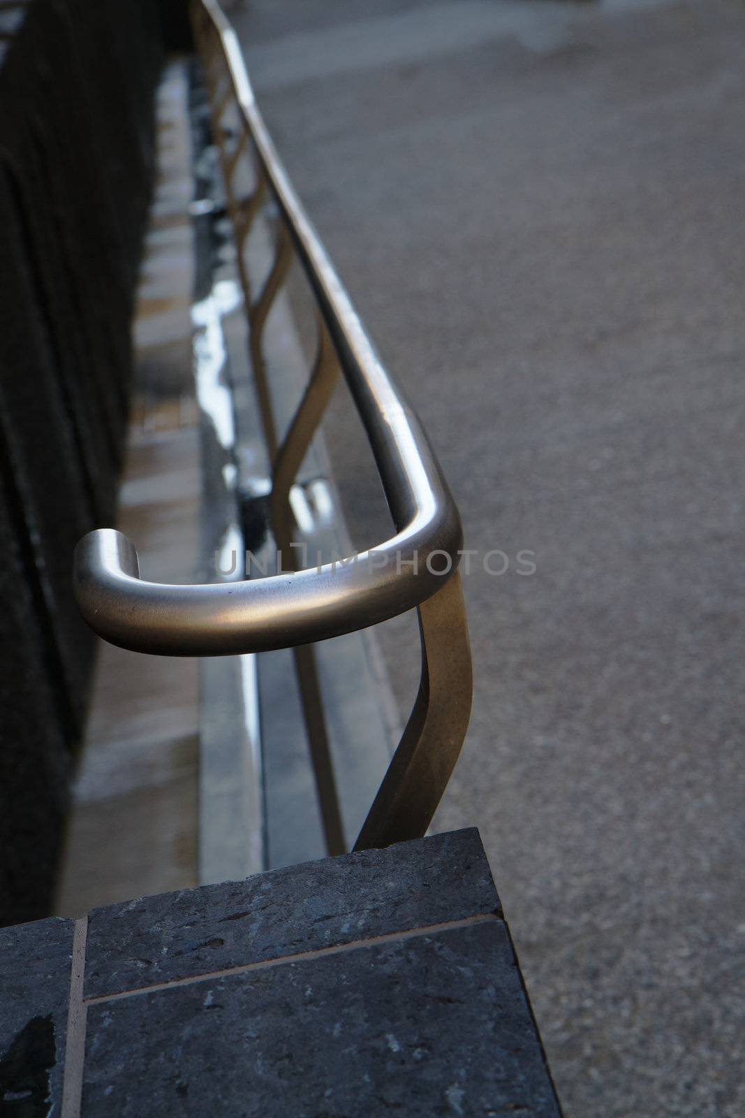 Stainless steel sidewalk railing  with curved start