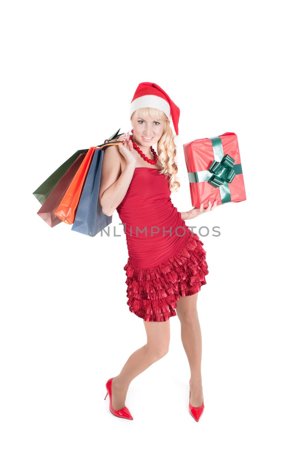 Happy woman with Christmas presents isolated on white