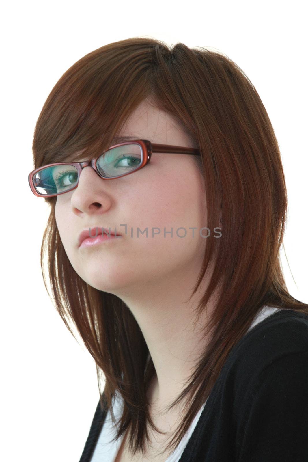 Portrait of young beautiful female teenager in glasses isolated on white background