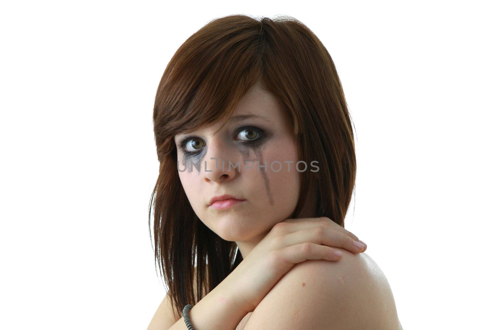 Crying young girl isolated on white background