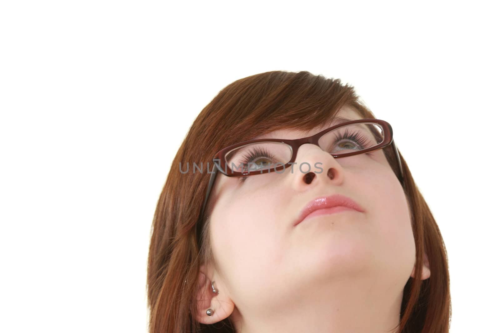 Portrait of young beautiful female teenager in glasses isolated on white background