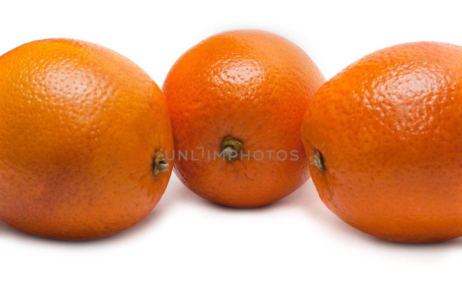 Three oranges, invoice of the skin insulated on white background