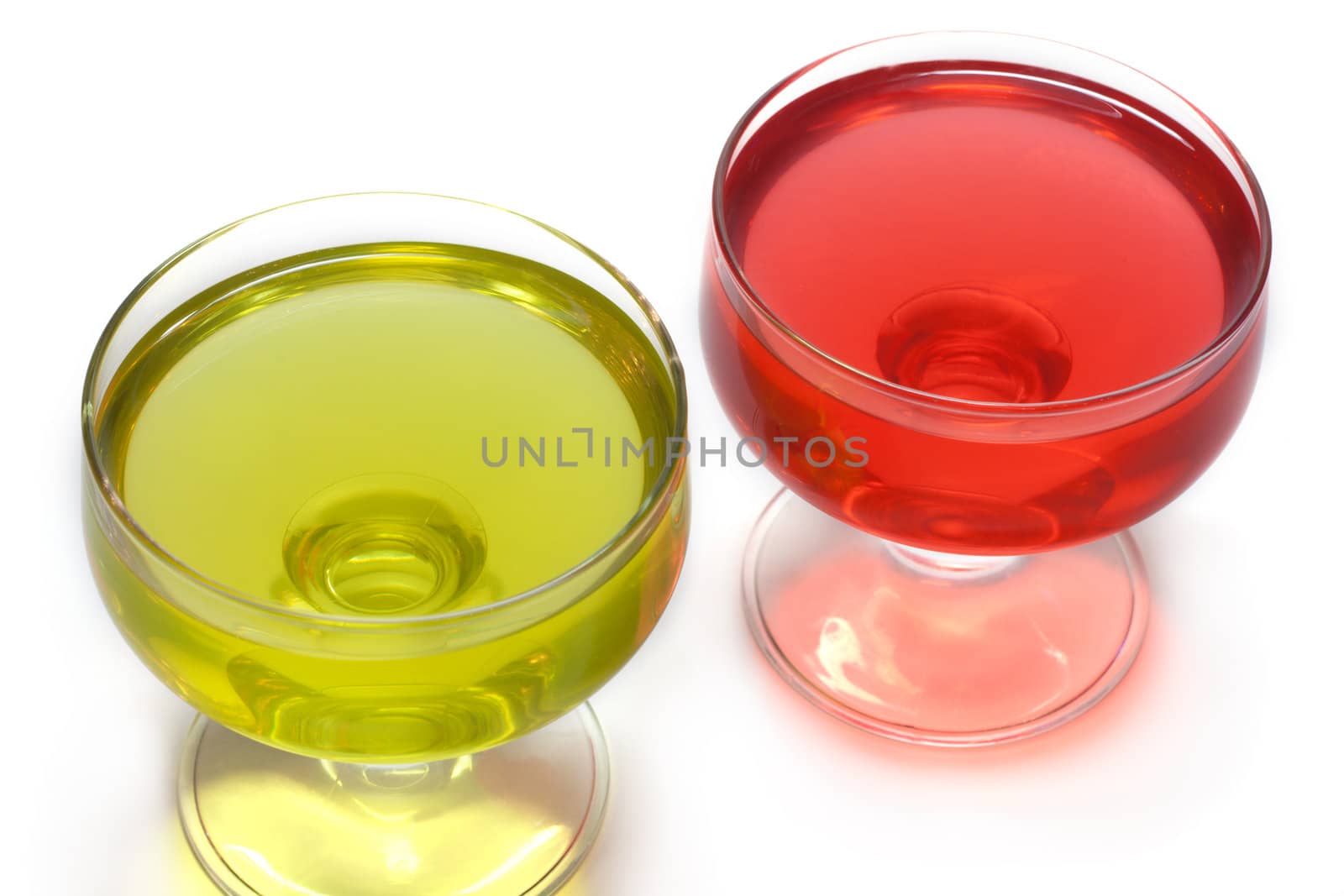 Red jelly in transparent glass, transparent, on white background