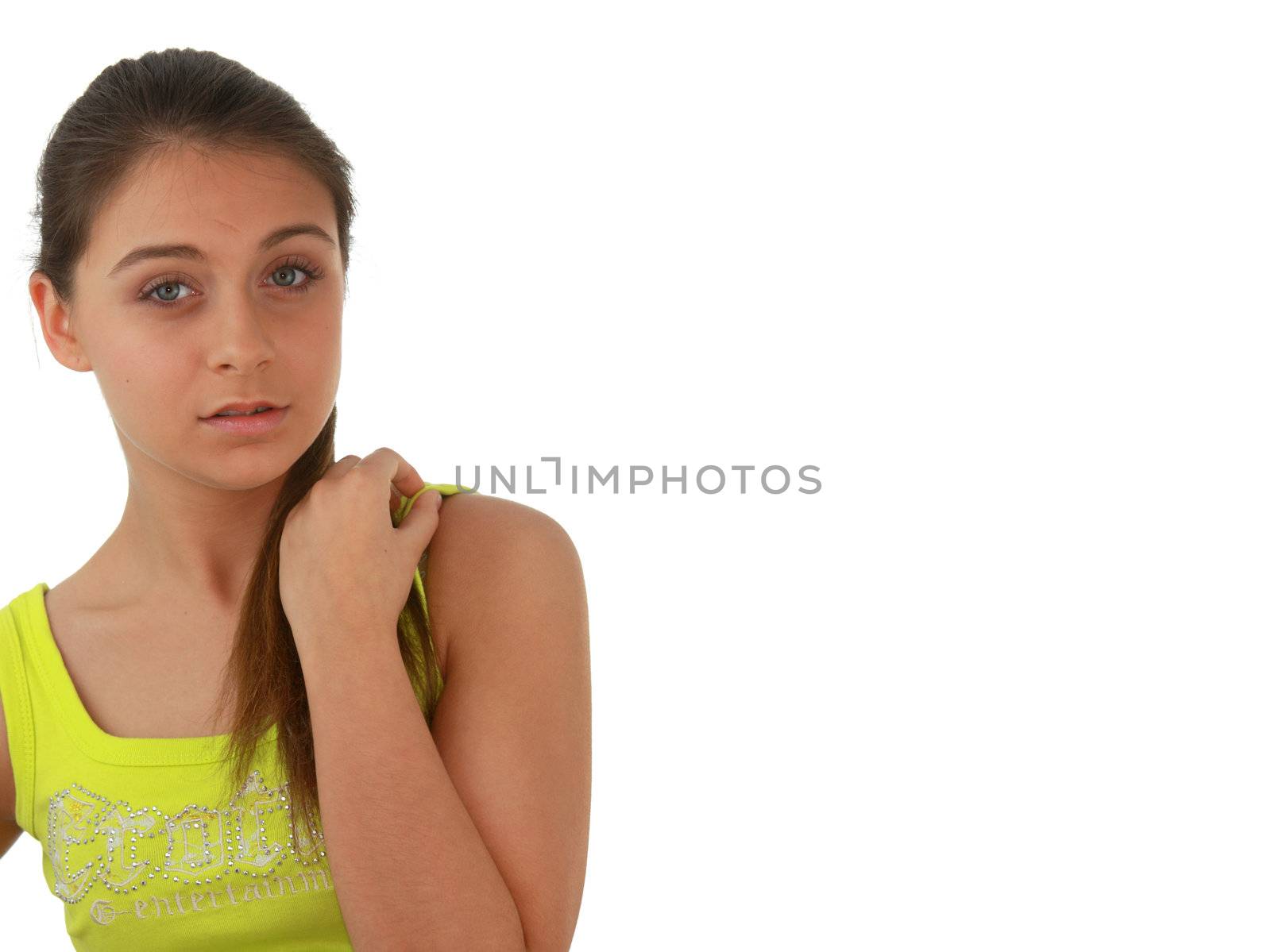 Young girl in green shirt portrait isolated on white background