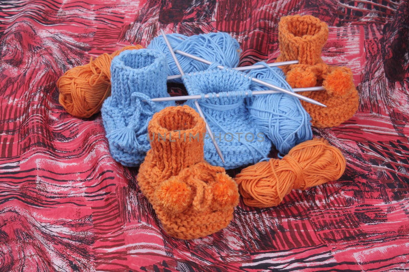 Close look on woollen baby shoes