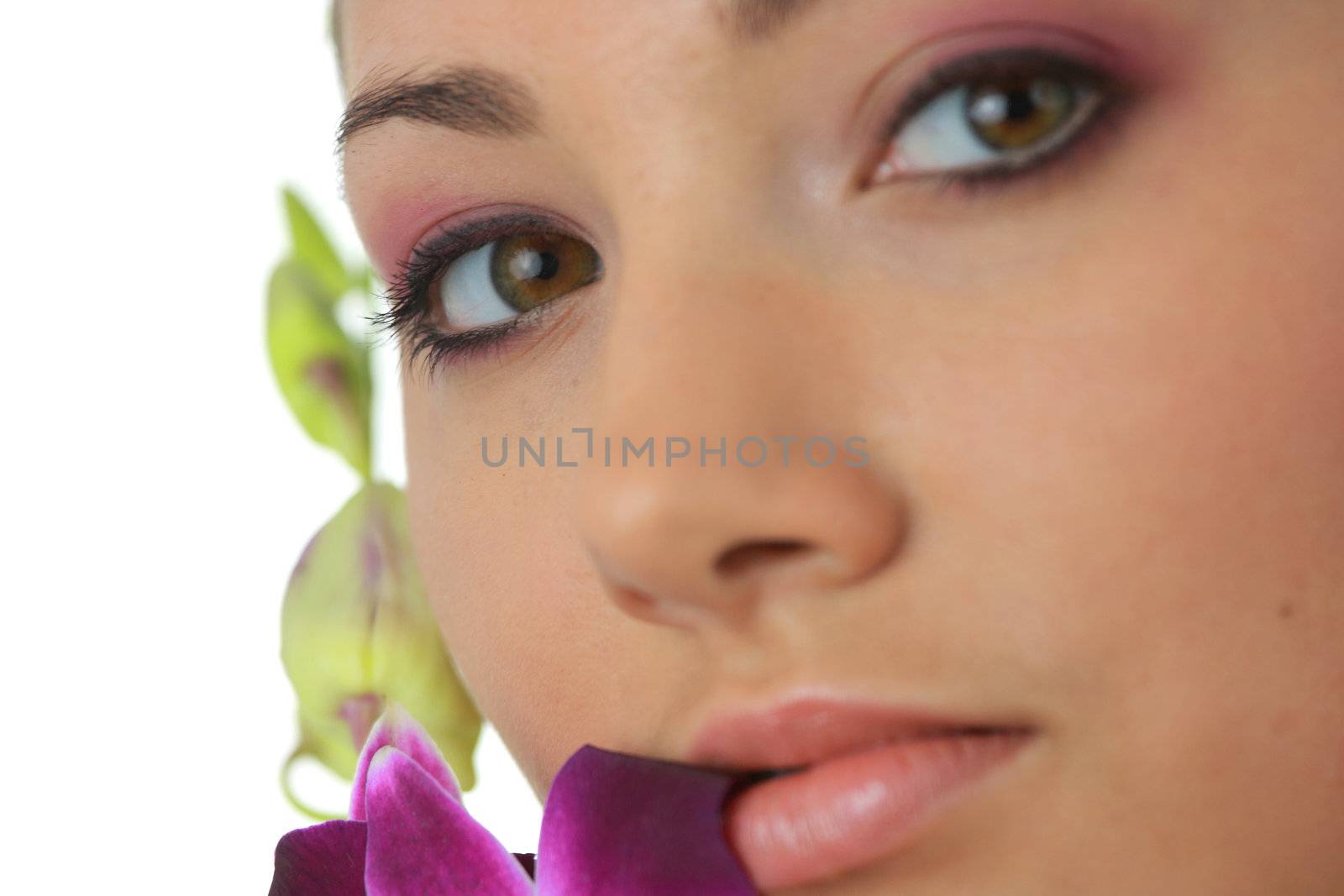 Beauteful spa girl with orchid isolated on white background