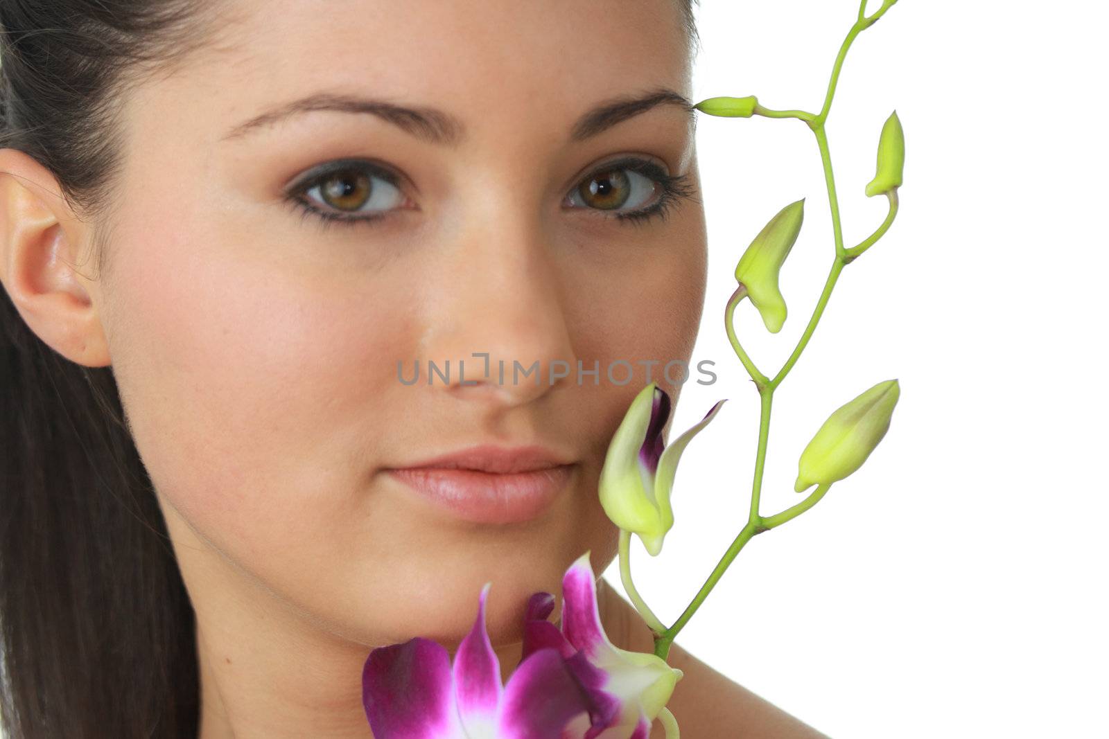 Beauteful spa girl with orchid isolated on white background