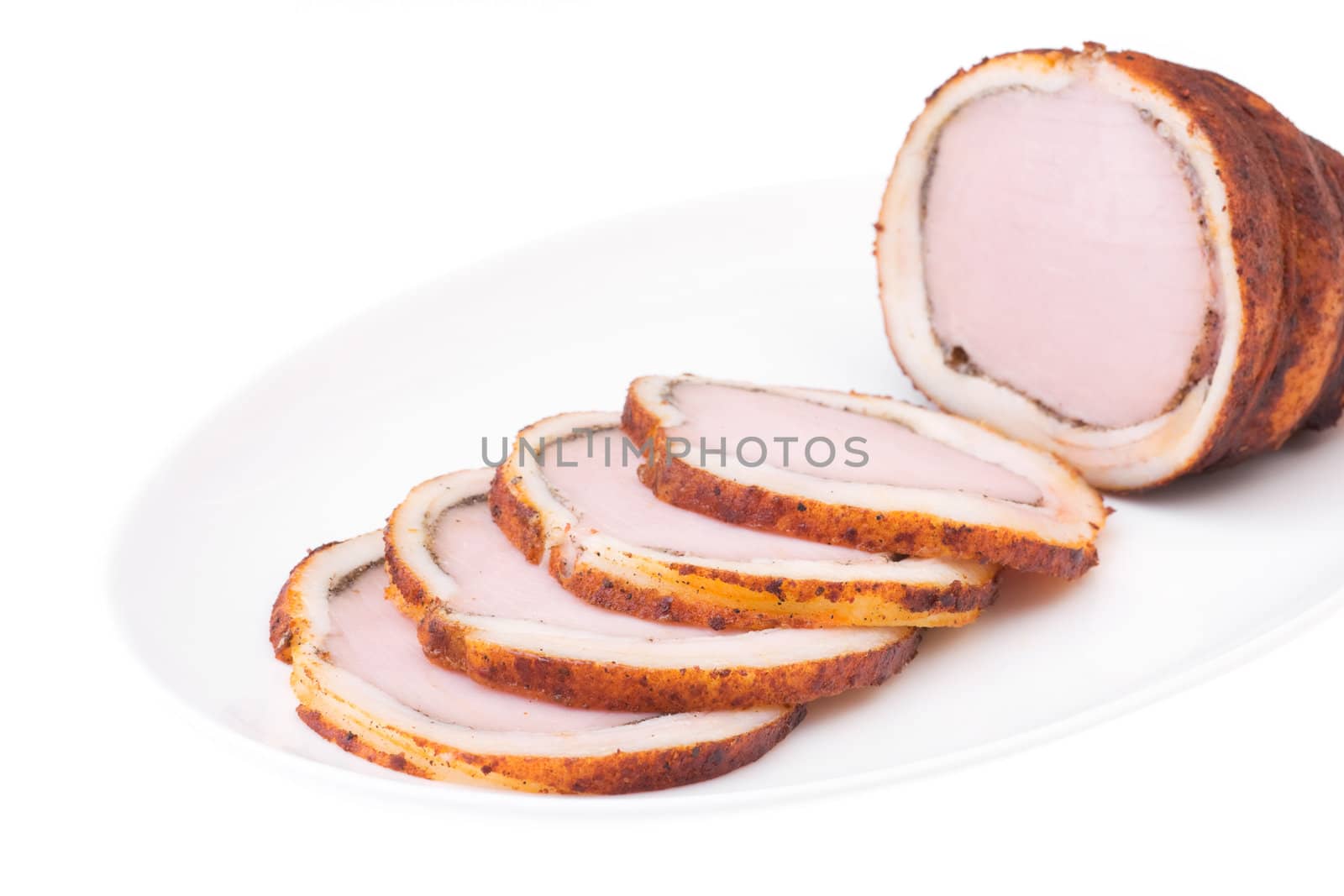 Delicious baked ham with bacon isolated over white. Bon appetit!