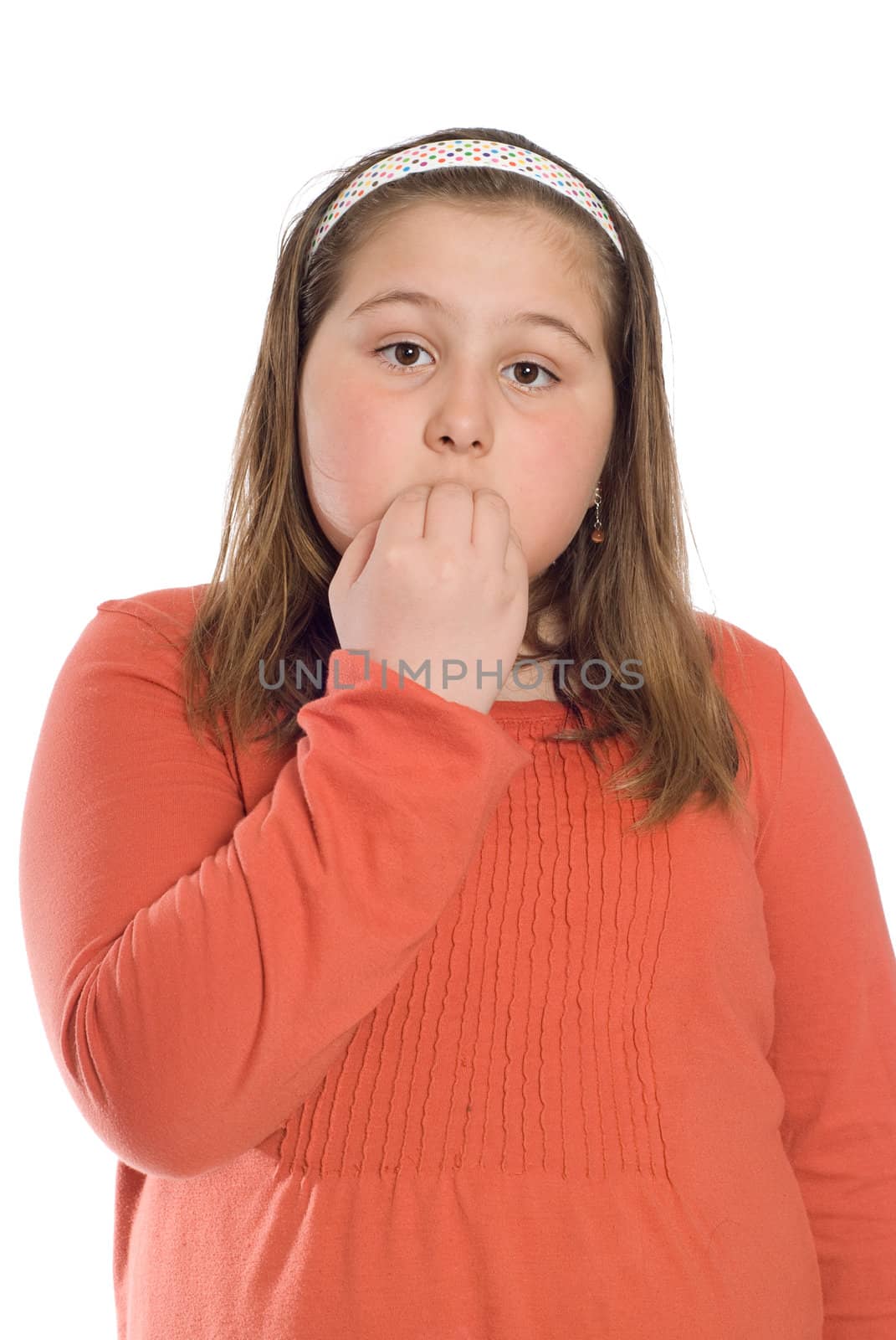 A nervous child chewing her fingernails, isolated against a white background