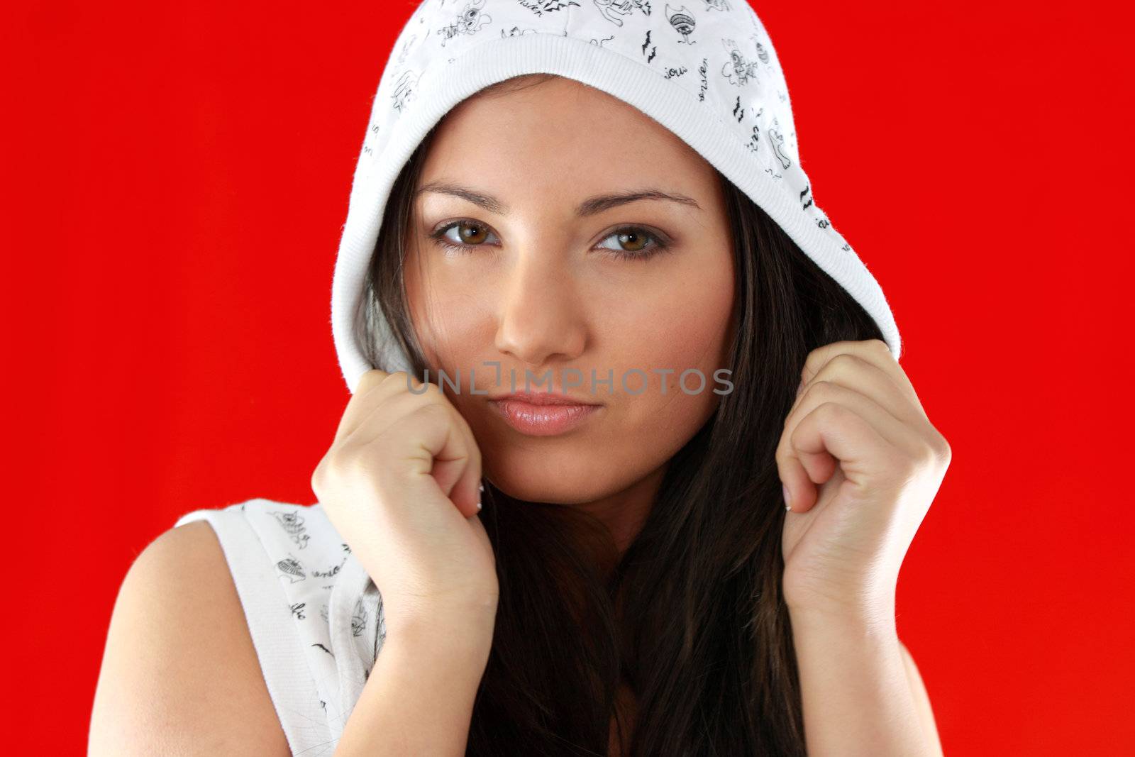 Young sexy girl portrait over red background
