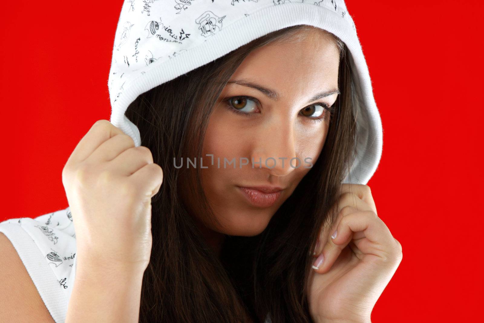 Young sexy girl portrait over red background