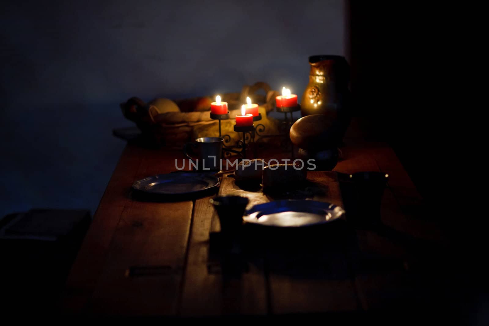 fresh meal in middle ages by candle light at evening
