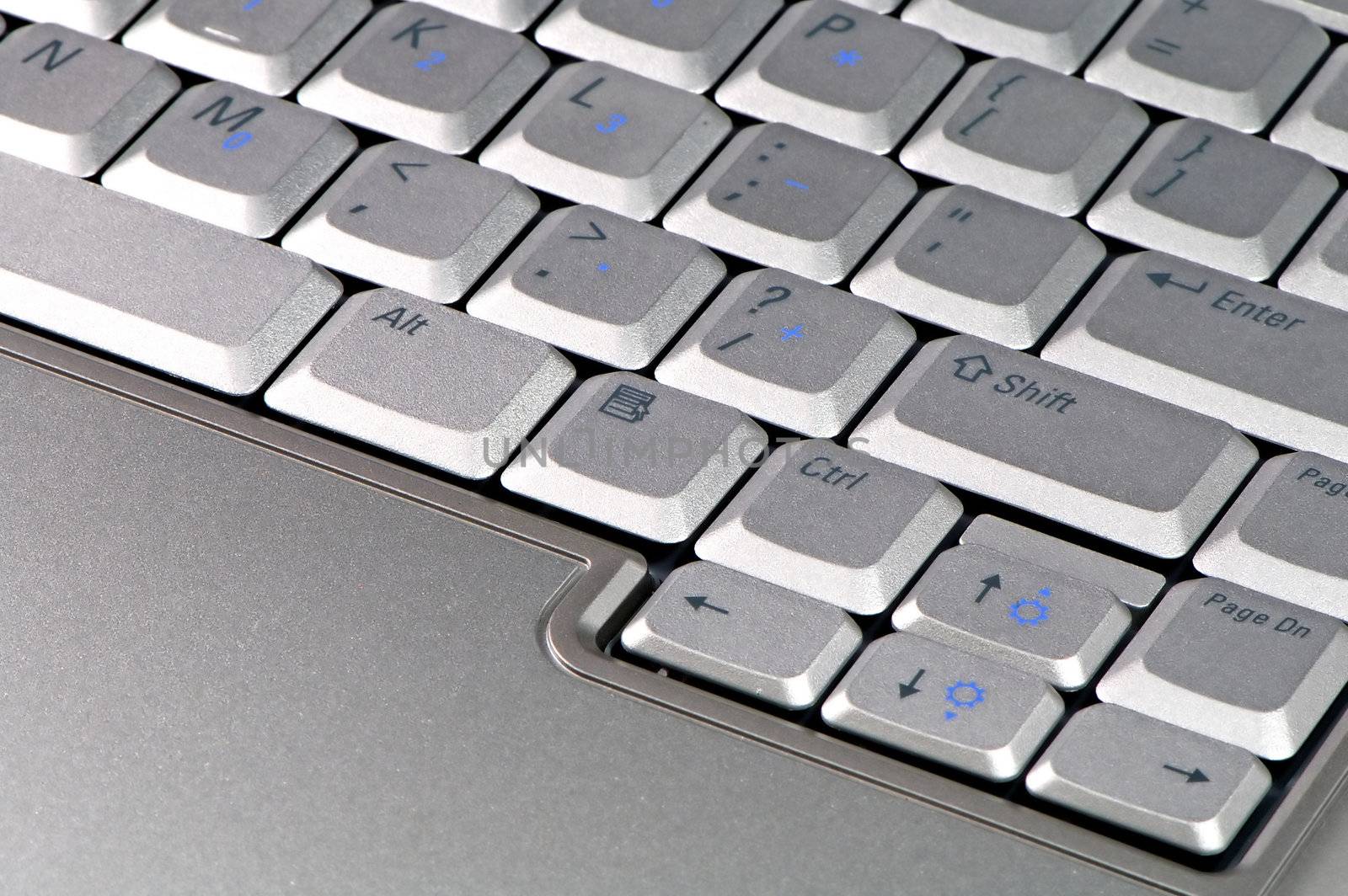 The close up of modern laptop computer's keyboard