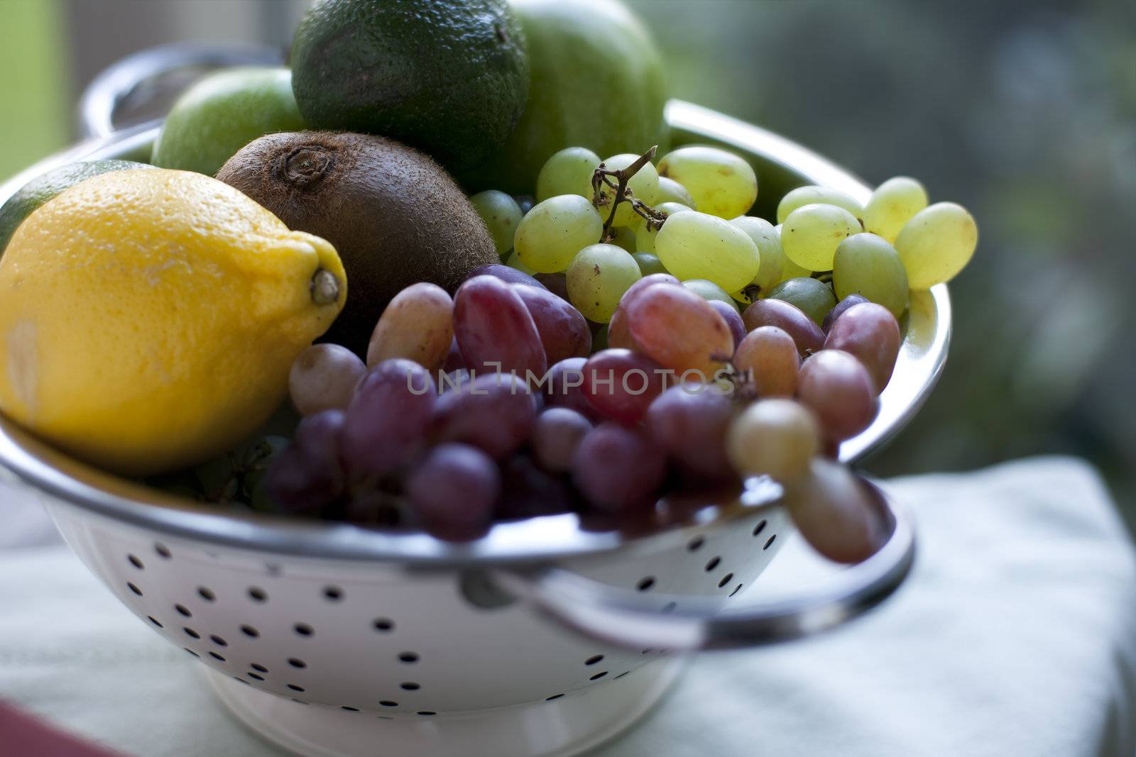 Close Up of Fruit in Colander.   by charlotteLake