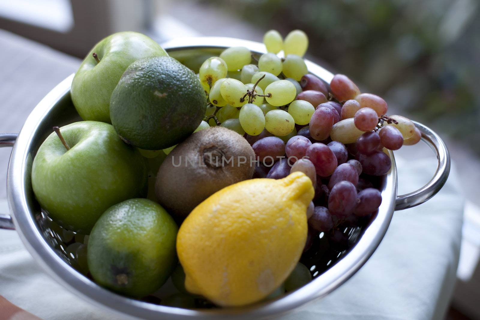 Colander with Fresh Fruit by charlotteLake