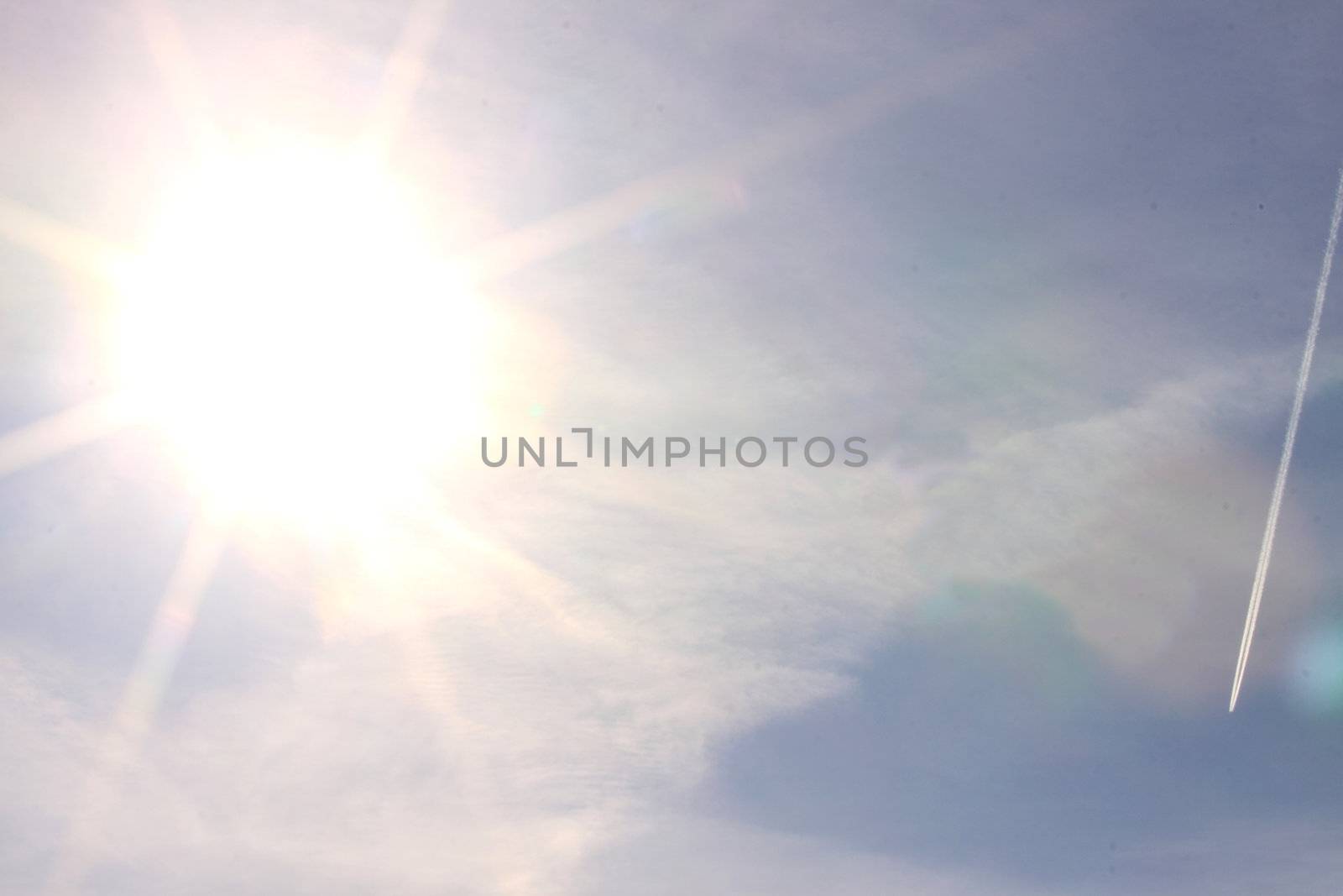sunny sky background with cloud and little plane