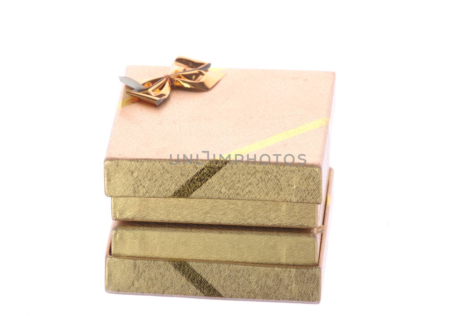 Beautiful golden gift box on white by BDS