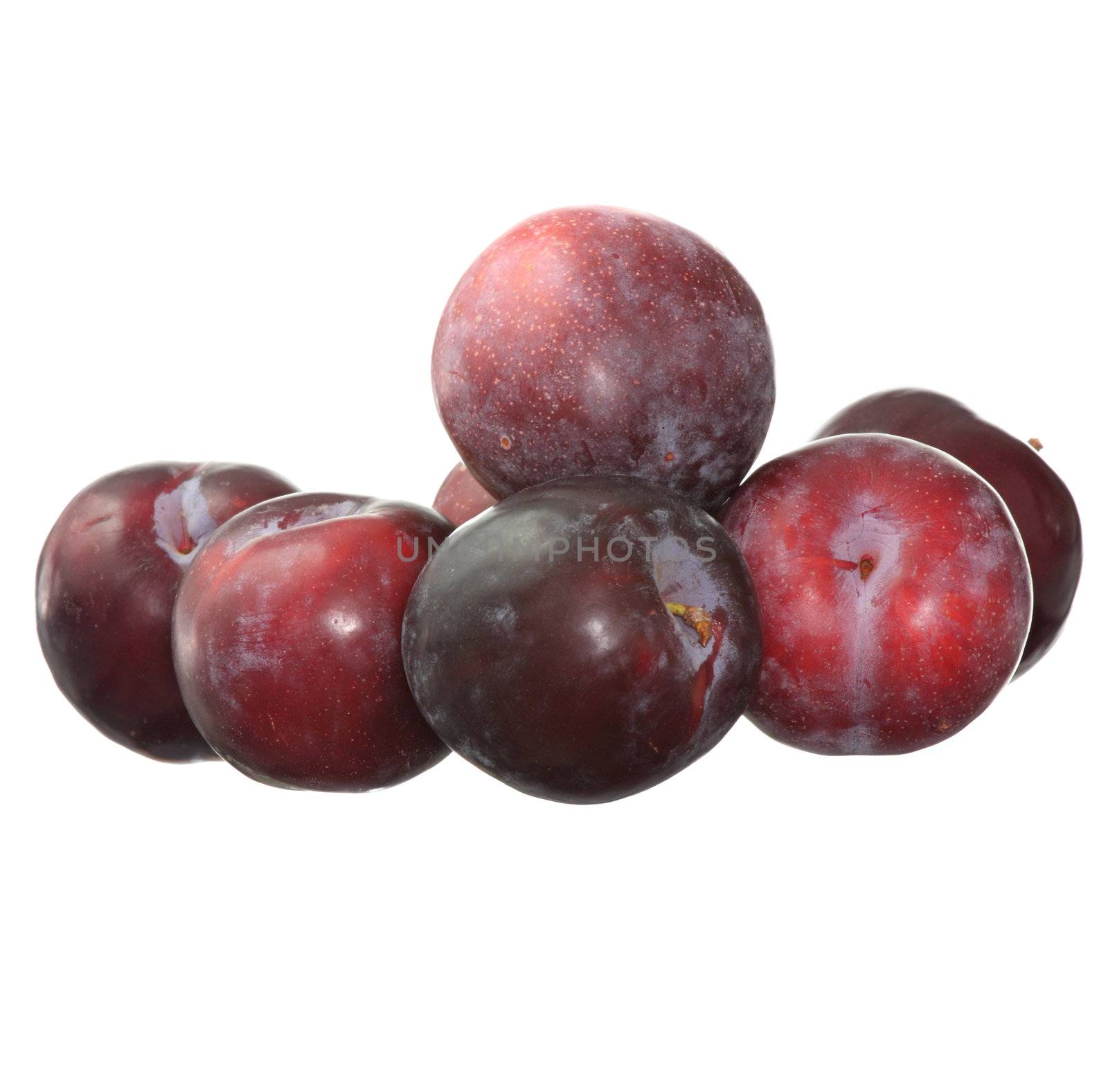 Fresh plums isolated on white background