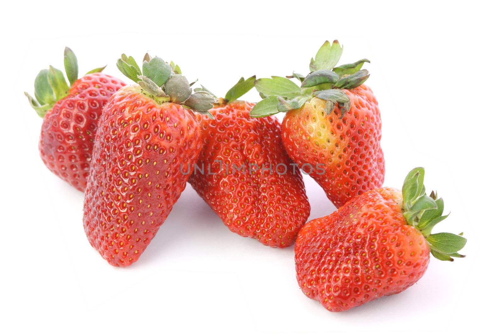 Strawberries over white background by BDS