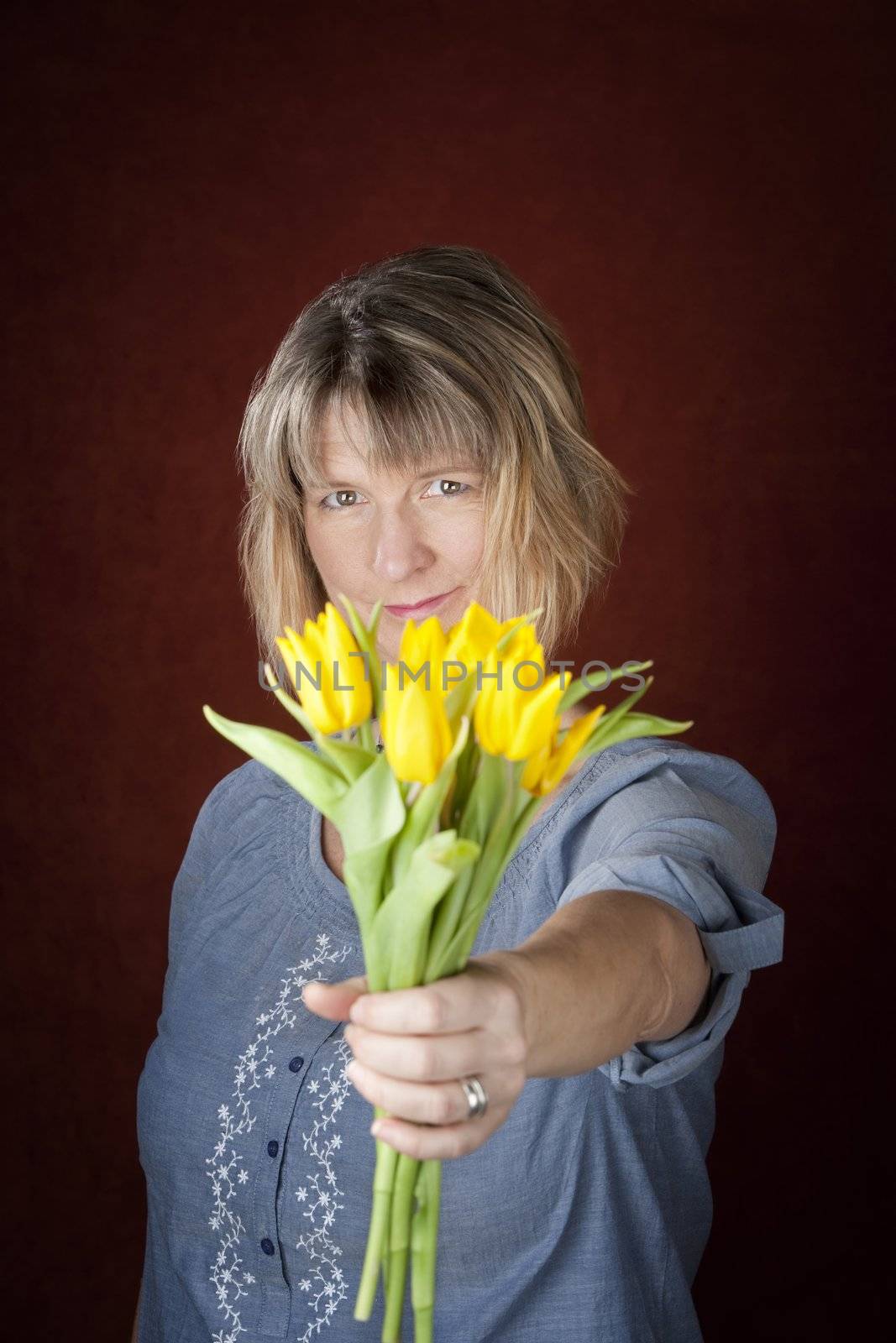 Woman with Yellow Tulips by Creatista