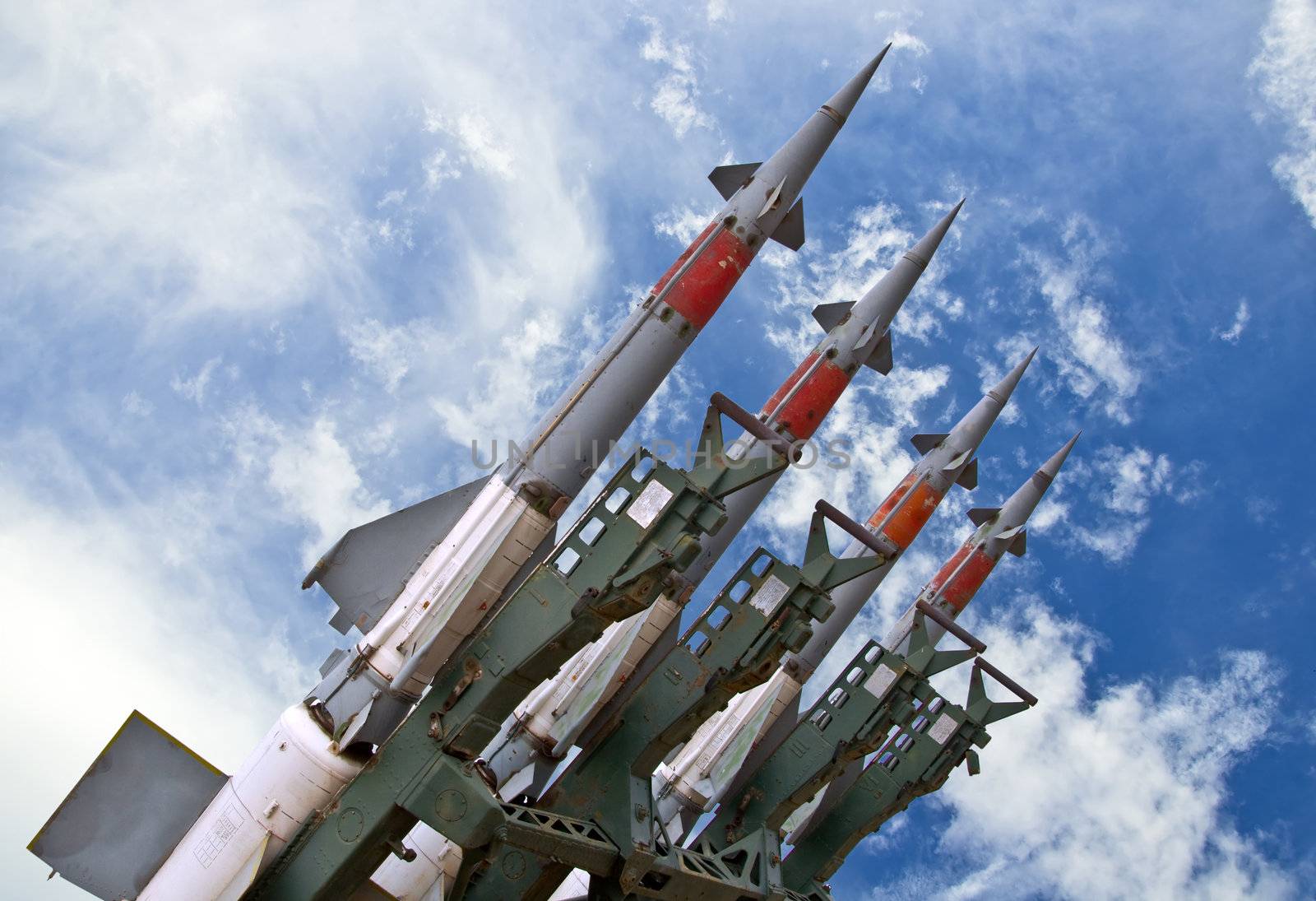 Several combat missiles aimed at the blue sky. Missile weapons.