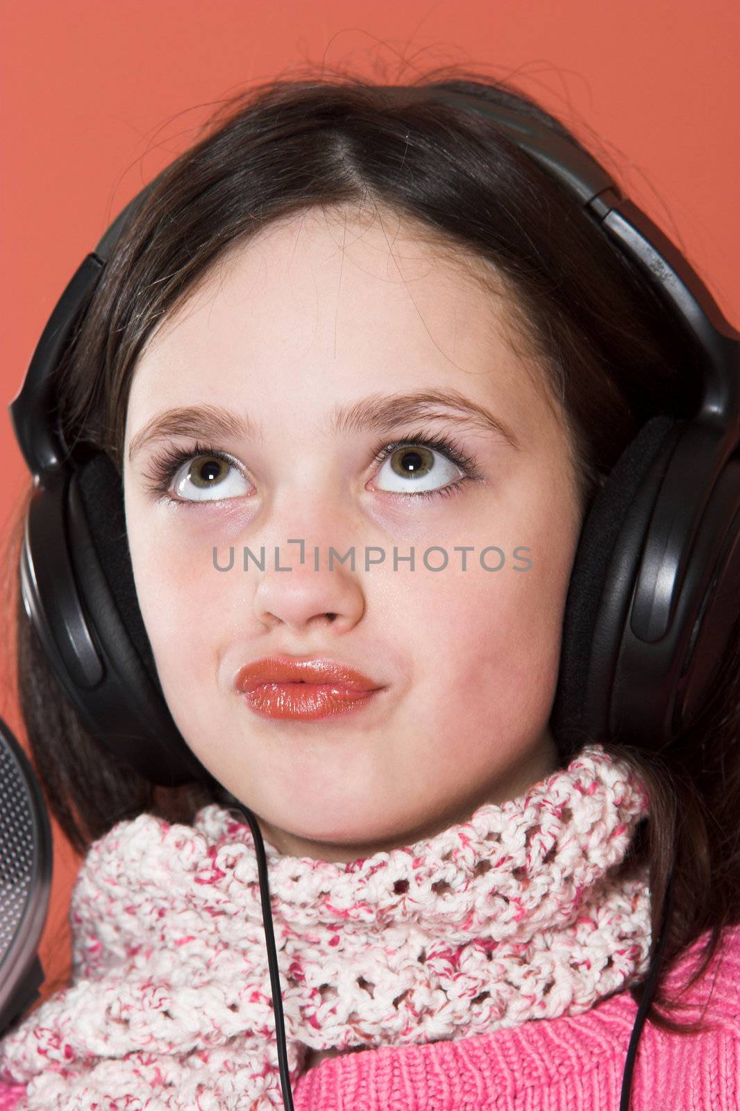 pretty girl listening music in headphones