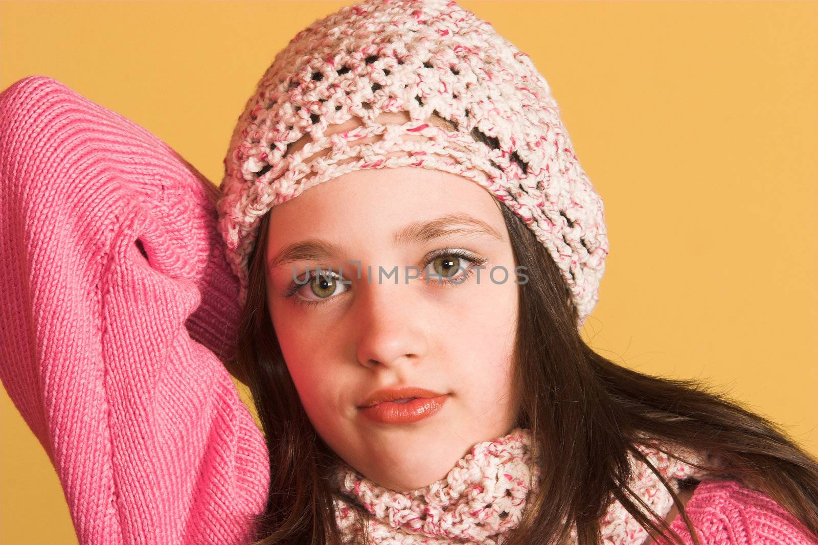 portrait of pretty girl on yellow background