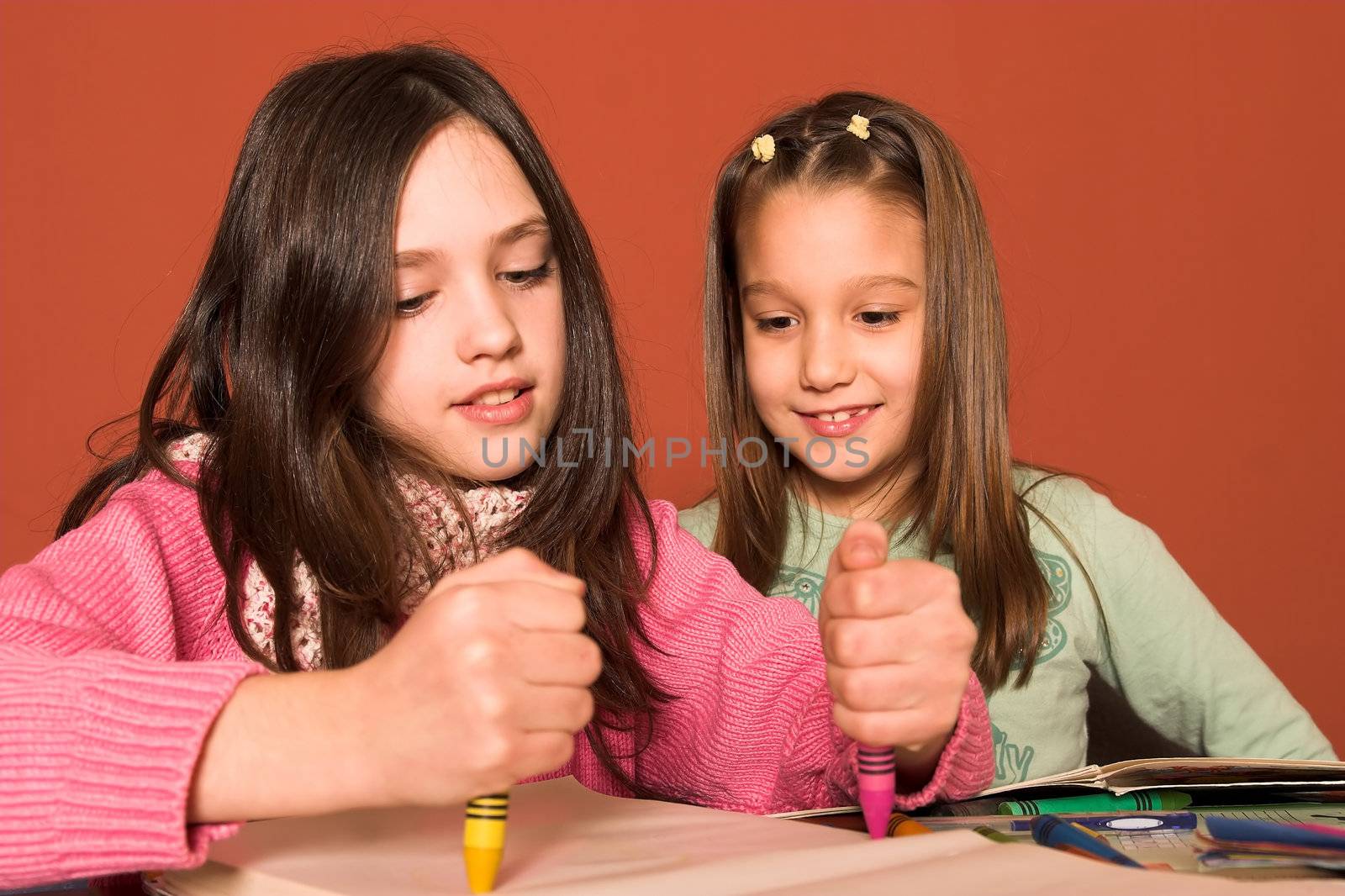 girls drawing in classroom