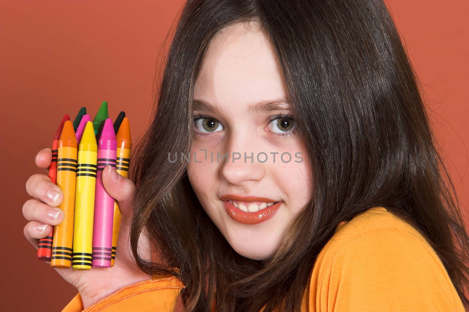 portrait of pretty girl with colored pencils