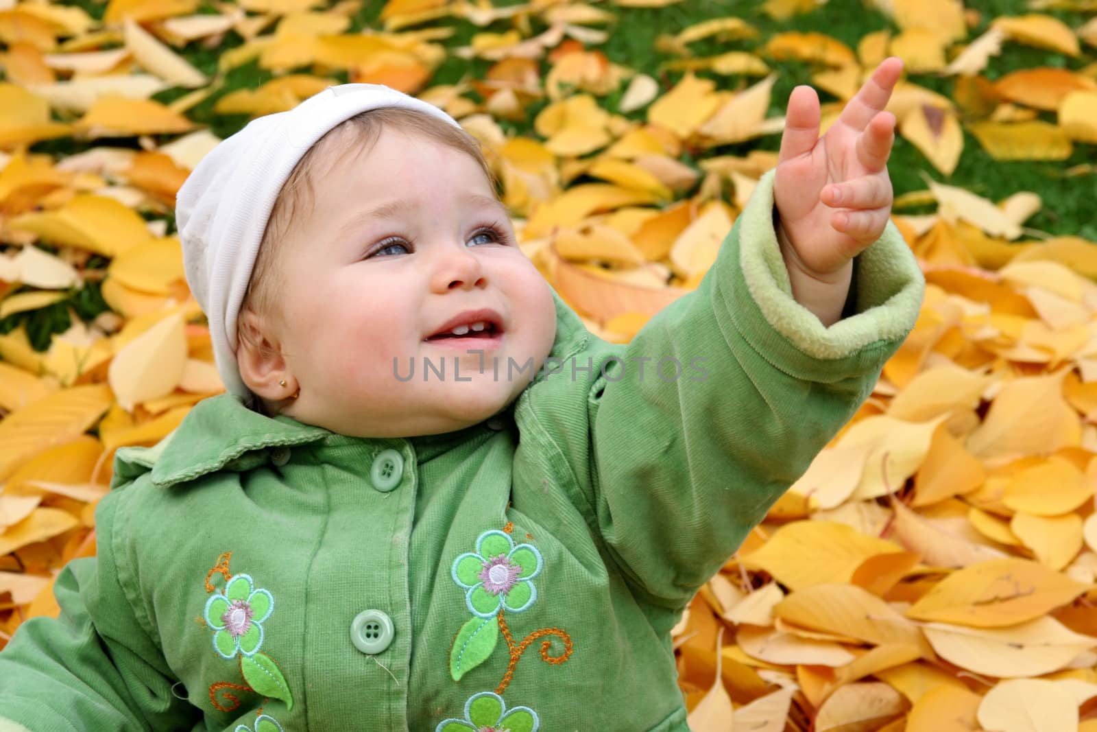 baby at a park in Autumn by vladacanon