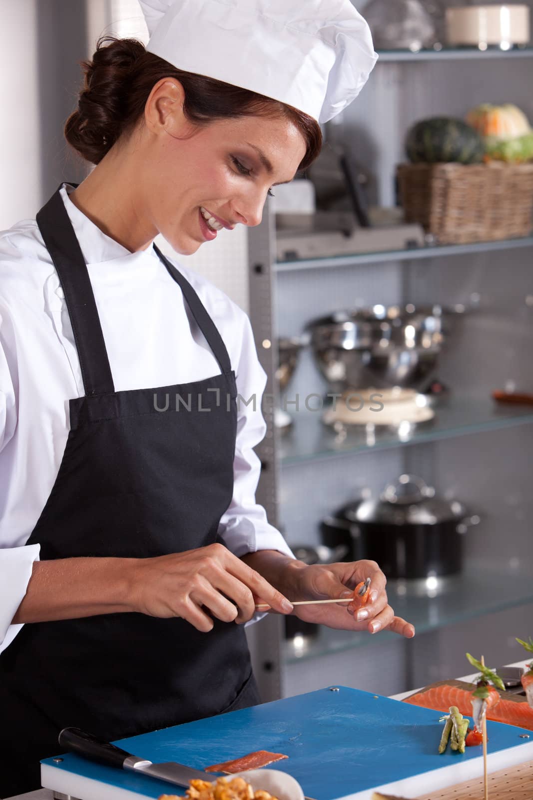 Young chef at work in the kitchen