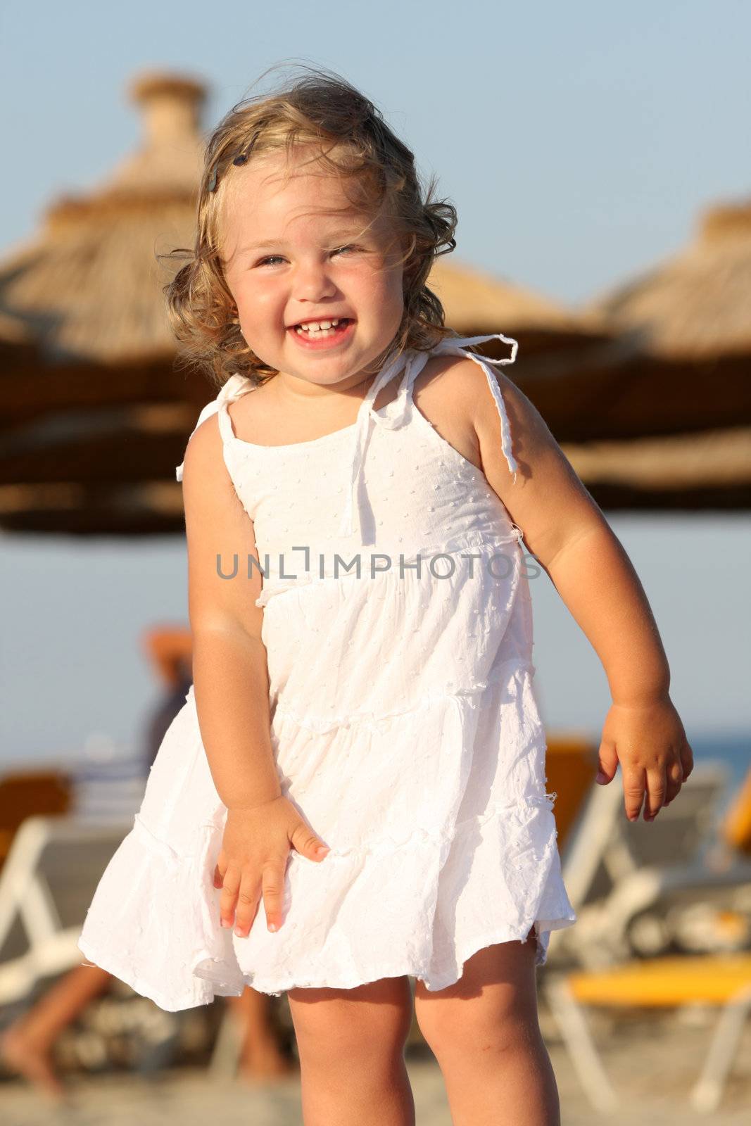 little girl at beach by vladacanon