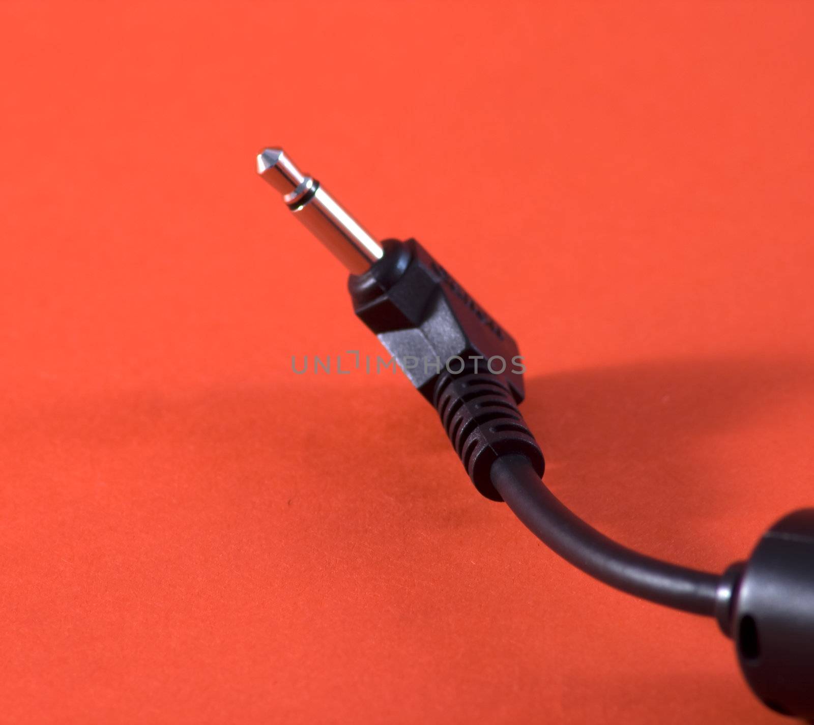 Head of a black audio cable