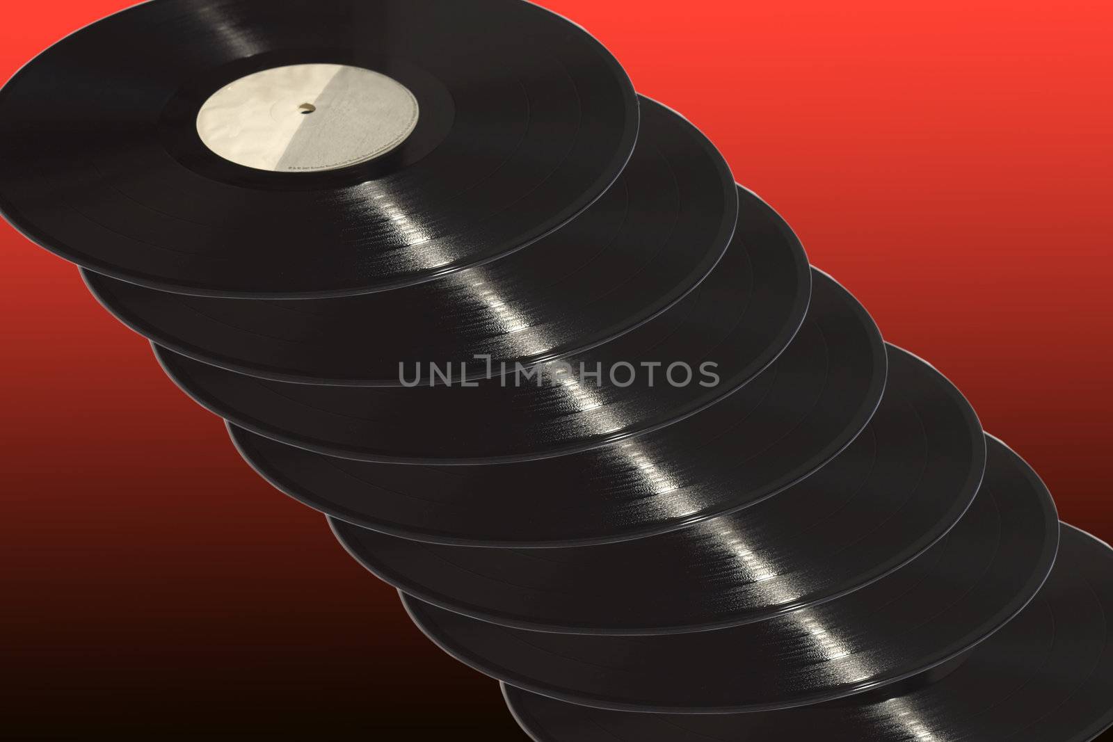 Many records on red and black background