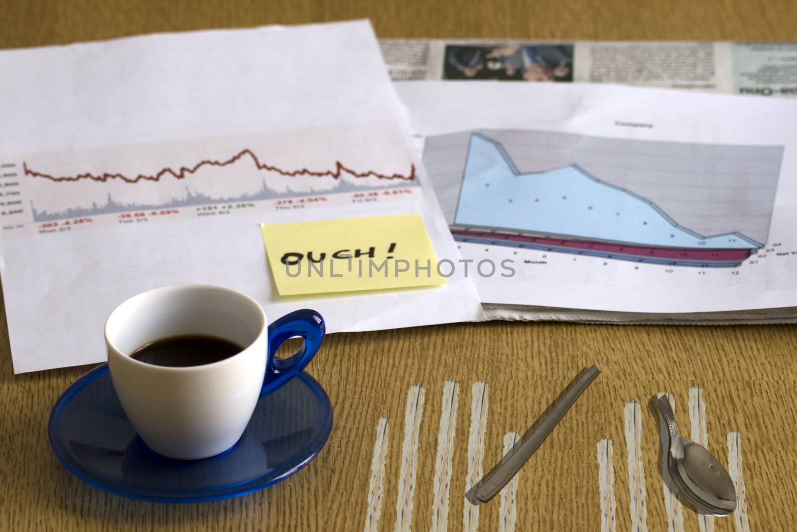 Coffee break with bad news for a manager, with broken spoon and nail scratches on wood