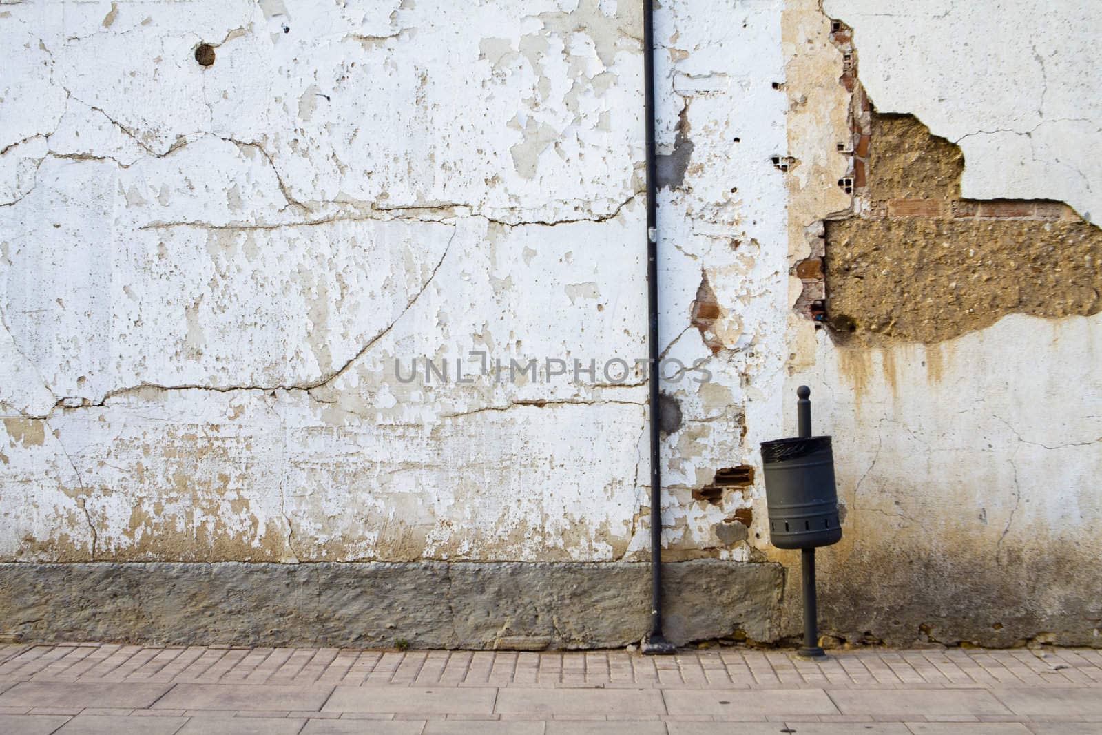 old street with rusty wall