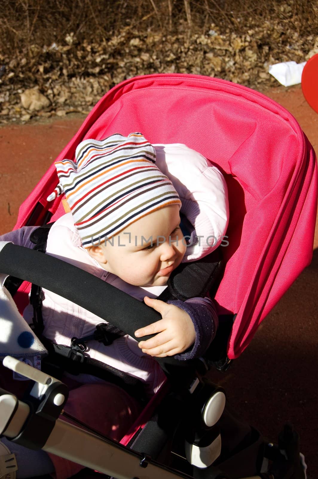 Photo of 11 months old baby sitting in pram