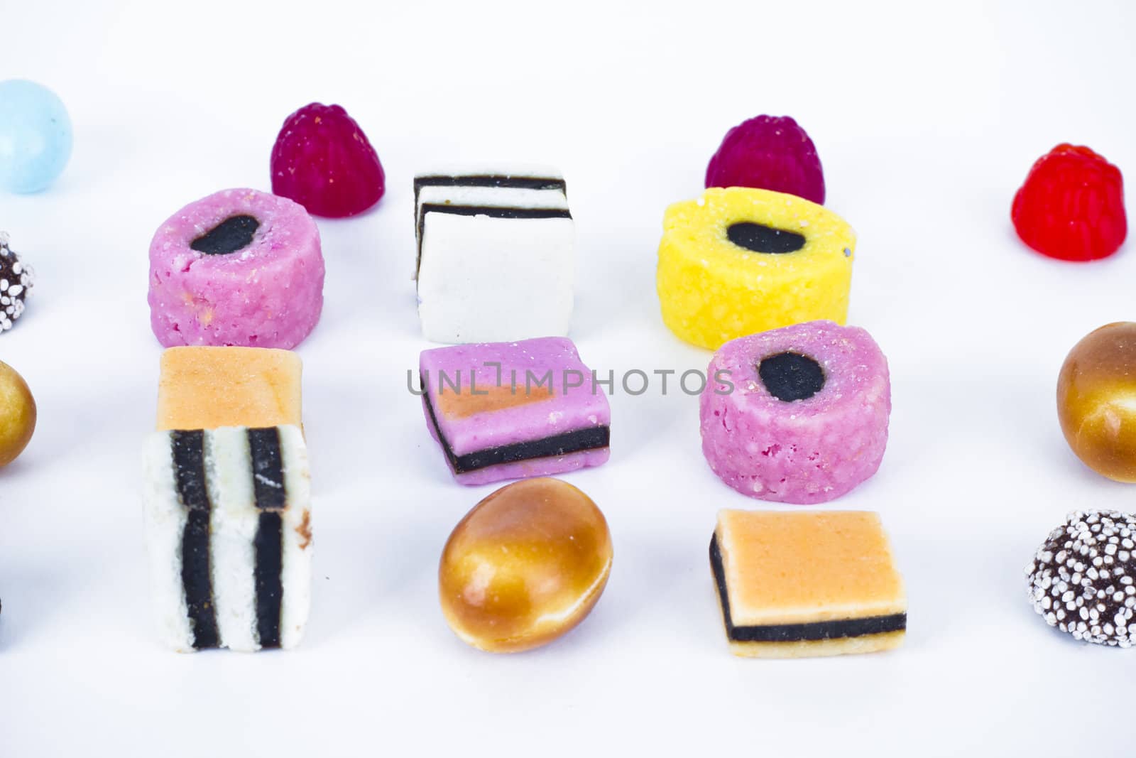 Many candy on white background.Fruit snacks by FernandoCortes