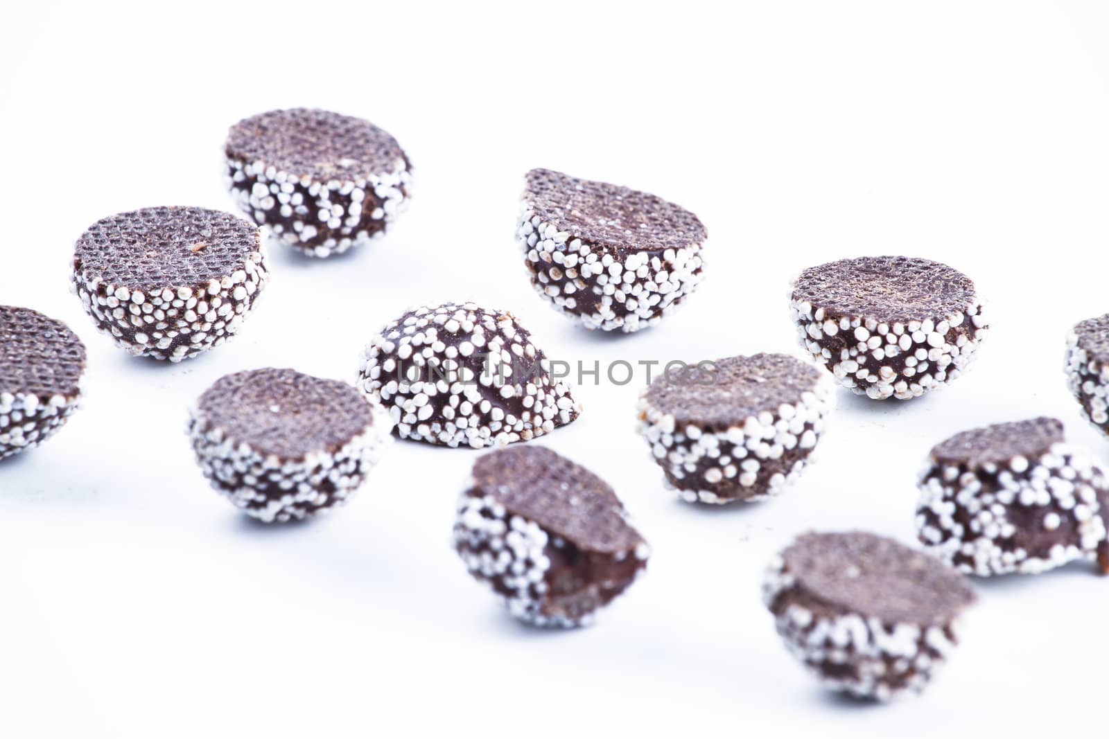 Small candy-coated chocolate cream