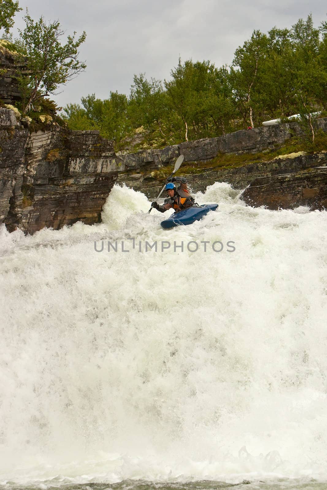 August kayak trip on the waterfalls of Norway