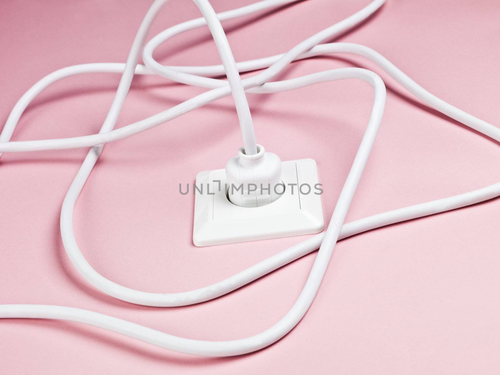 Electric Power Cable on Pink Background