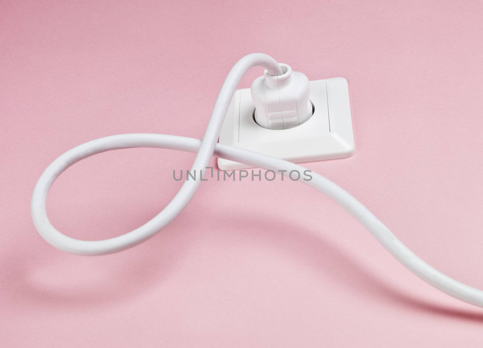 Electric Power Cable on Pink Background