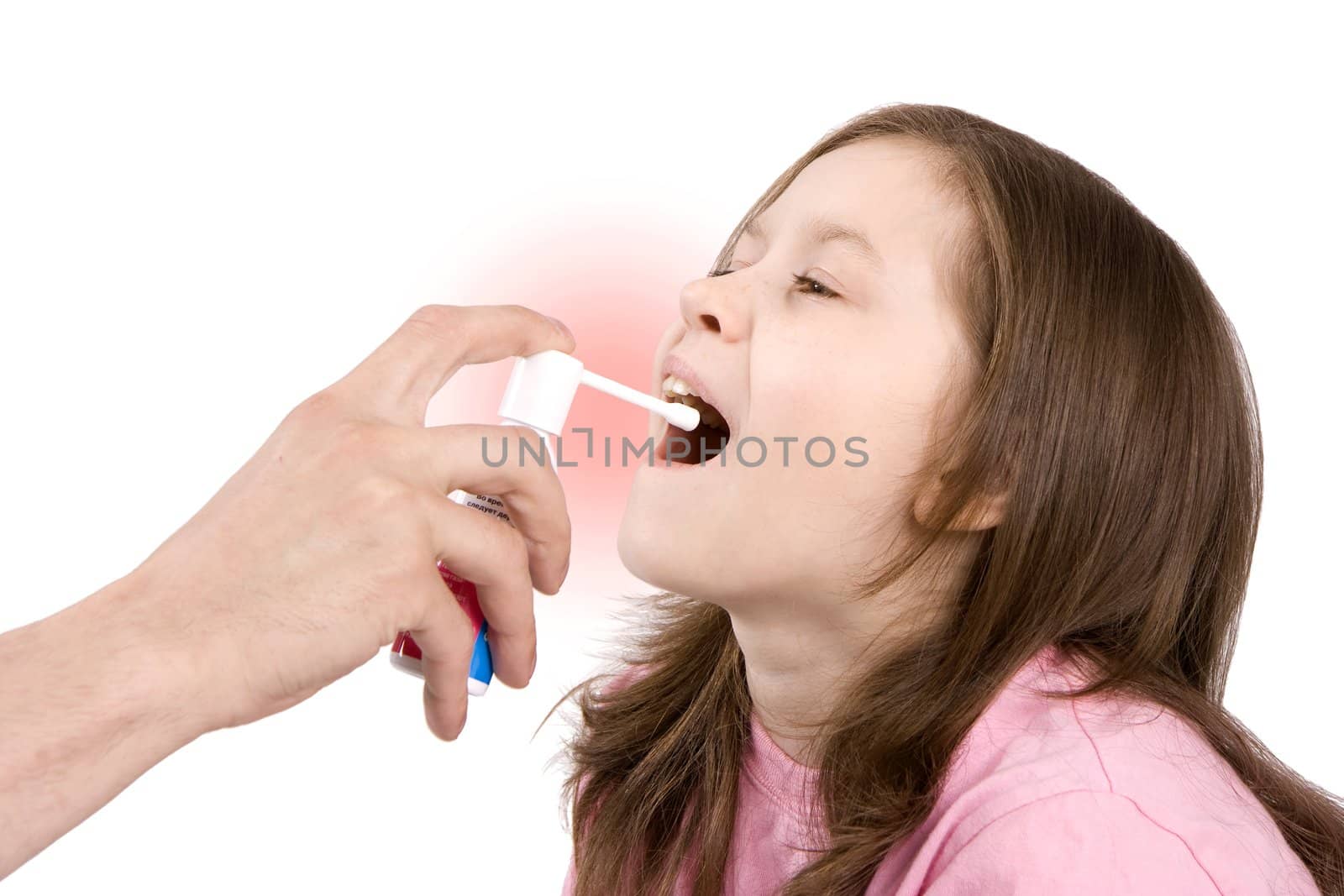 The man's hand holds capacity with a medicine near a mouth of the girl