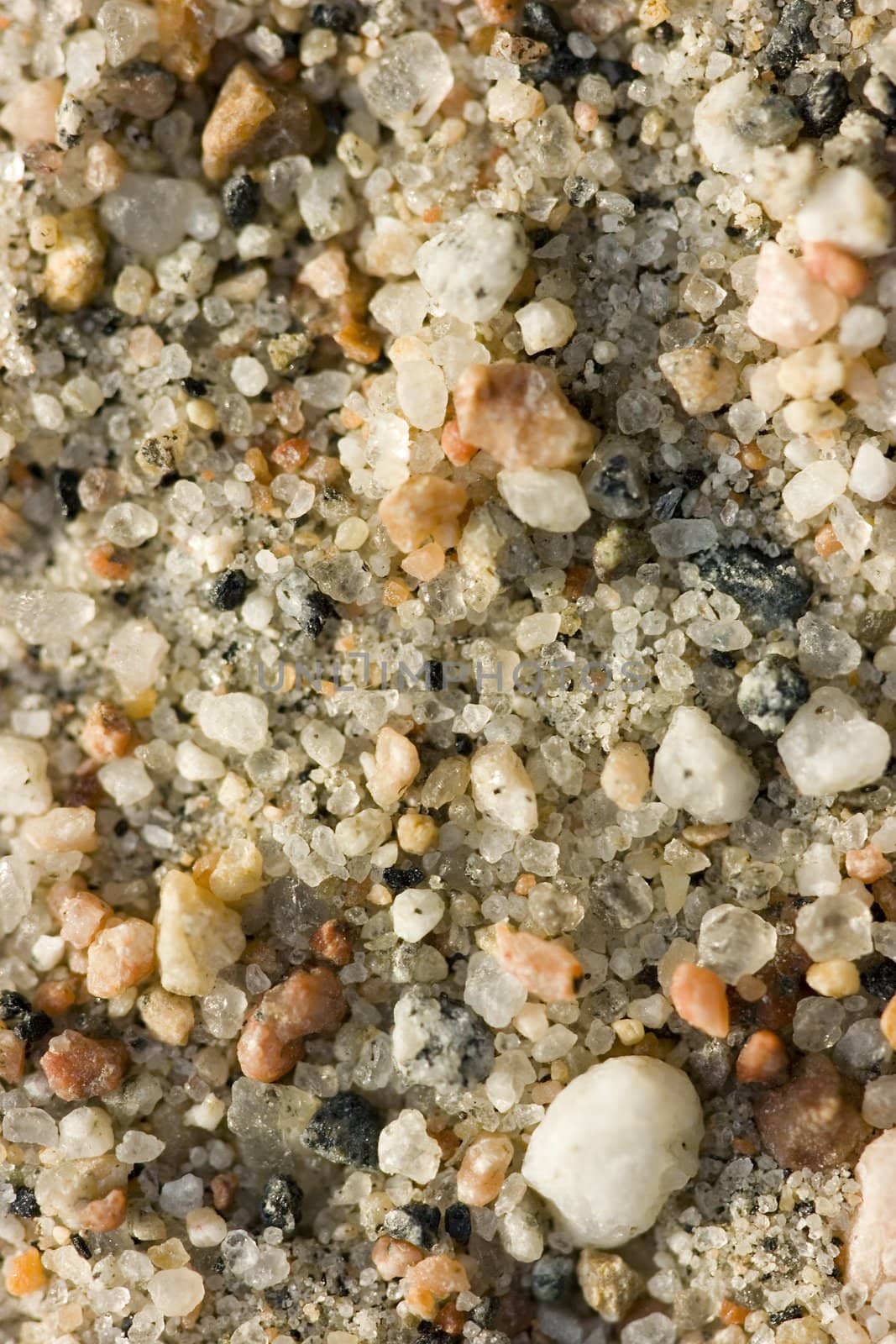 Photo close up of sandy soil with stones