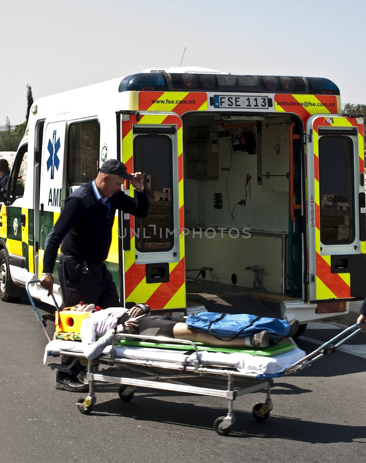 MOSTA, MALTA - APR16 - An injured cyclist being loaded into an ambulance on April 16, 2009